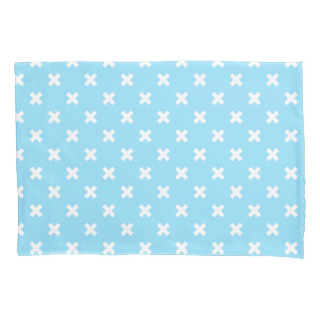 White cross stitches on baby blue pillowcase (Front)