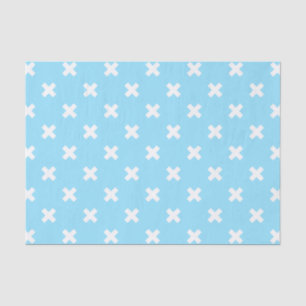 White cross stitches on baby blue tissue paper