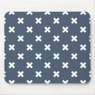 White cross stitches on blue-grey mouse pad