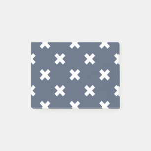 White cross stitches on blue-grey post-it notes