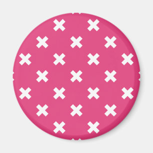 White cross stitches on fuchsia magnet
