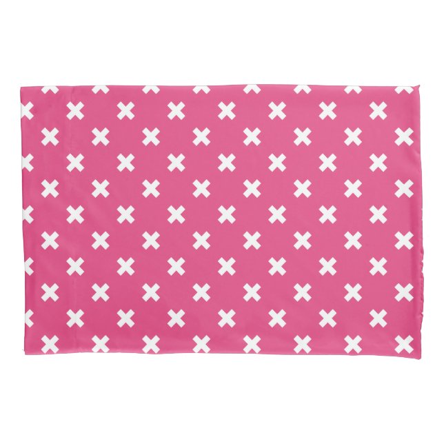 White cross stitches on fuchsia pillowcase (Front)