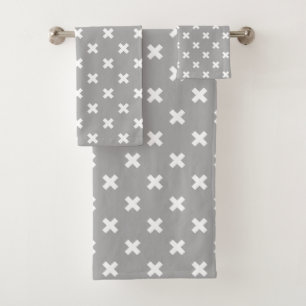 White cross stitches on grey bath towel set