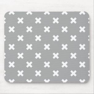 White cross stitches on grey mouse pad