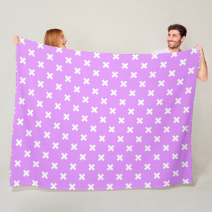 White cross stitches on lilac fleece blanket