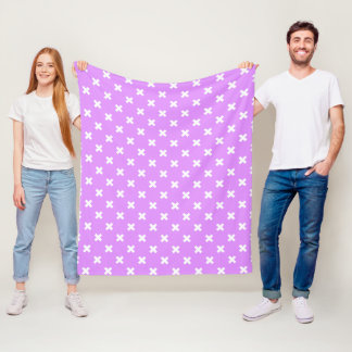 White cross stitches on lilac fleece blanket