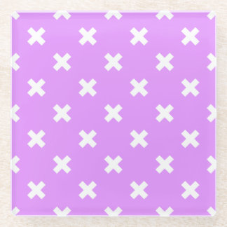 White cross stitches on lilac glass coaster