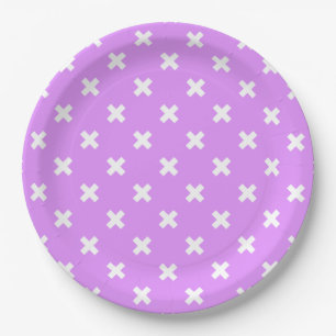 White cross stitches on lilac paper plate