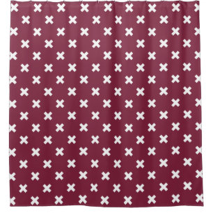 White cross stitches on mulberry