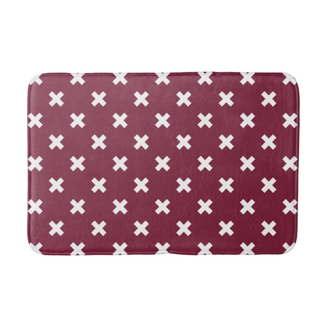 White cross stitches on mulberry bath mat (Front)