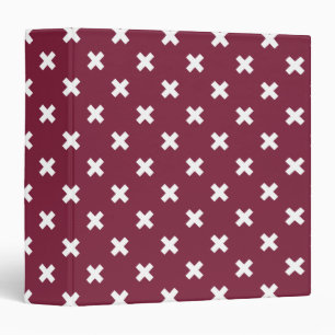 White cross stitches on mulberry binder