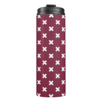 White cross stitches on mulberry