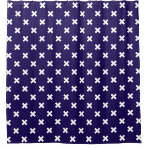 White cross stitches on navy blue
