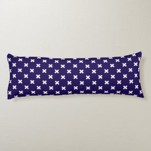 White cross stitches on navy blue body pillow