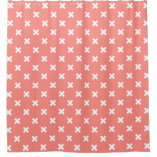 White cross stitches on peach