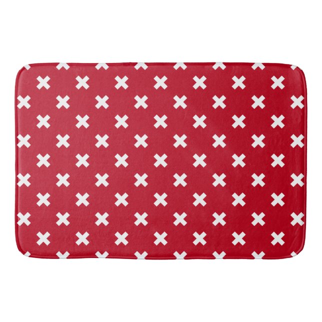 White cross stitches on red bath mat (Front)