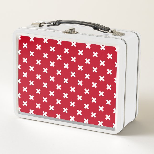 White cross stitches on red metal lunch box (Front)