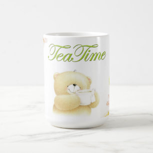 White cup with a Teddy bear print and flowers.