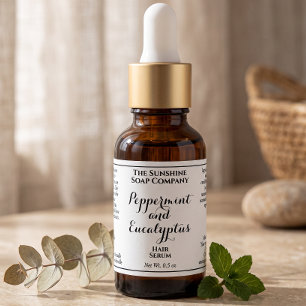 White curly text cosmetics dropper bottle label