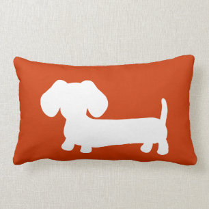 White Dachshund with on orange Lumbar Pillow