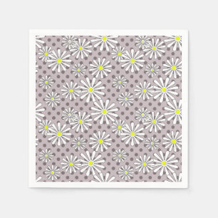 White daisy flowers on a beige brown polka dot napkin