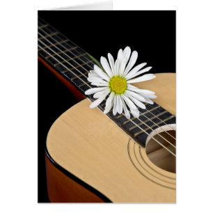 White daisy on guitar