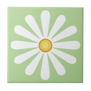 White daisy, yellow centre, on pale green tile