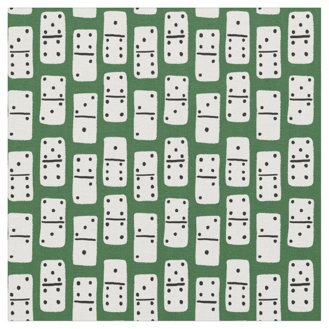 White Dominoes with Black Dots on Green Patterned Fabric (Close Up)