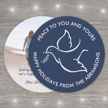 White Dove Bird of Peace Unique Round 1 Photo Navy Holiday Card<br><div class="desc">Wish family and friends a simple gift of peace for the holidays with an elegant dove one photo round greeting card. All wording on this template (including "Peace" on front) is simple to customize, making it suitable for Christmas, New Years, Hanukkah and Rosh Hashanah. The modern minimalist navy blue and...</div>