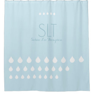 white drops with monogram on pale blue