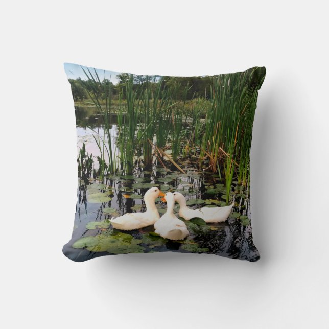 White ducks, lily pads, cattails, lake shore throw pillow (Front)