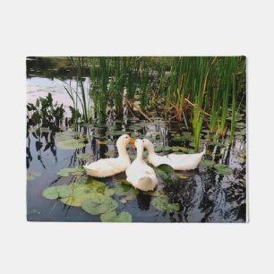 White dusks, cattails, lily pads, lakeshore design doormat