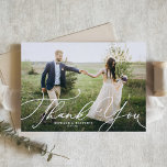White Elegant Beatrice Script Wedding Photo Thank You Card<br><div class="desc">Elegant Beatrice Script Photo Wedding Thank You Card | Send thanks to family and friends for being part of your special day with this customizable thank you card. It features white elegant modern calligraphy. Personalize by adding your details. This elegant photo thank you card is available on other cardstock.</div>