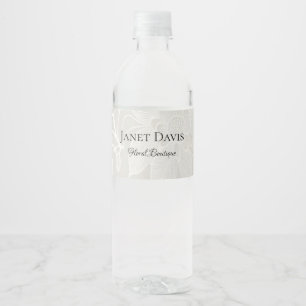 White engraved flowers silver water bottle label