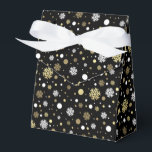 White Faux Gold Snowflakes Polkadots On Black Favor Box<br><div class="desc">Contemporary white and gold looking snowflakes and polka dots pattern on a black background. Modern but simple plain whimsical design for wrapping those fun birthday,  surprise,  or Christmas presents with. Available on products such as wrapping and tissue paper,  gift tags,  bags and favour boxes,  stickers and ribbons</div>