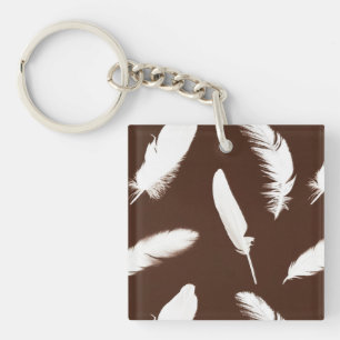 White feather print on chocolate brown keychain