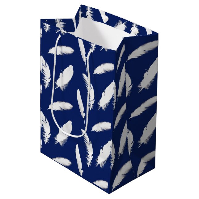 White feather print on dark blue medium gift bag (Front Angled)