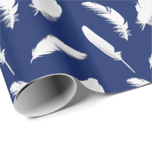 White feather print on dark blue wrapping paper
