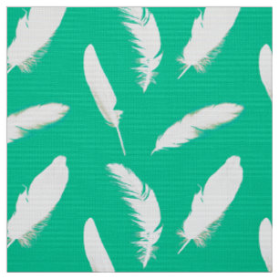 White feather print on turquoise fabric