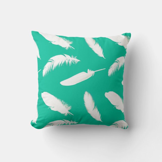 White feather print on turquoise throw pillow (Front)