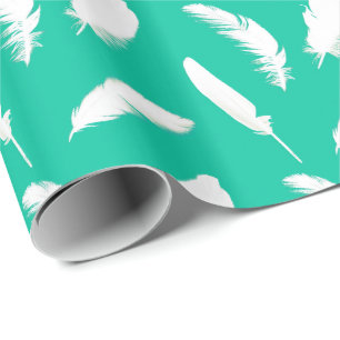White feather print on turquoise wrapping paper