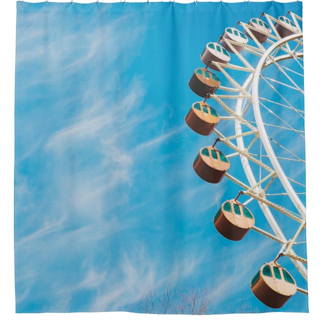 White Ferris wheel under clear sky in the morning (Front)