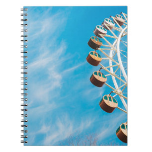White Ferris wheel under clear sky in the morning Notebook