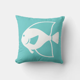 white fish on teal blue pillow