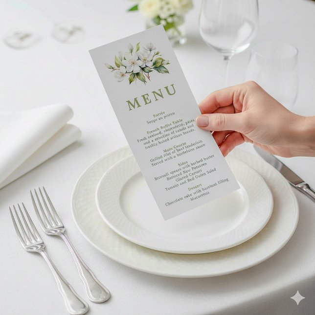 White Floral Botanical Wedding Menu Card (Pretty apple blossom wedding reception meal menu being held above a dining plate.)