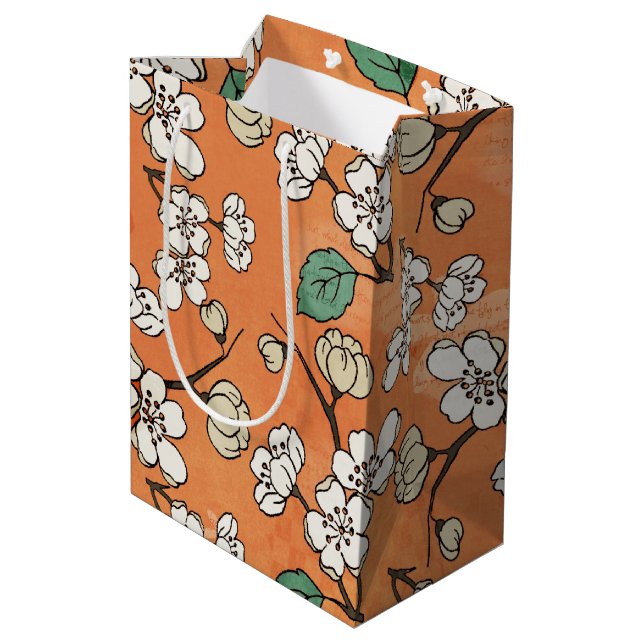 White Floral Design on Orange Medium Gift Bag (Back Angled)