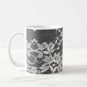 White floral lace: black background. coffee mug