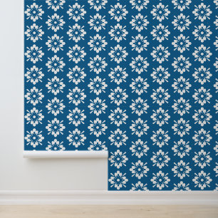 White floral pattern on blue wallpaper