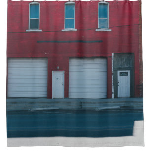 WHITE GARAGE DOORS CLOSED DURING DAYTIME