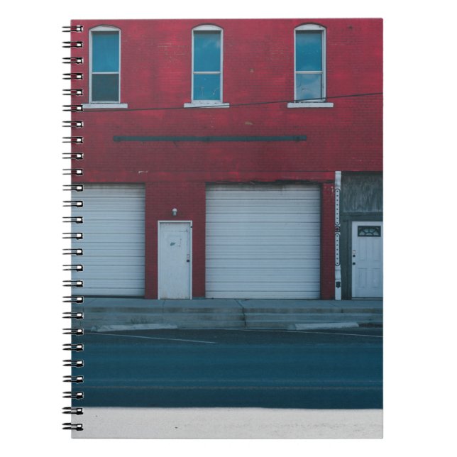 WHITE GARAGE DOORS CLOSED DURING DAYTIME NOTEBOOK (Front)